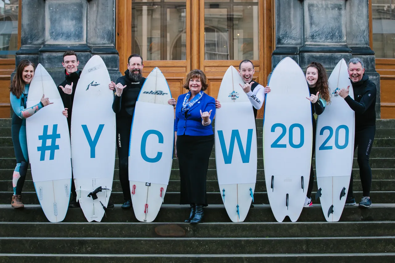 Surfers celebrate 50 days to go until the Year of Coasts and Waters 2020