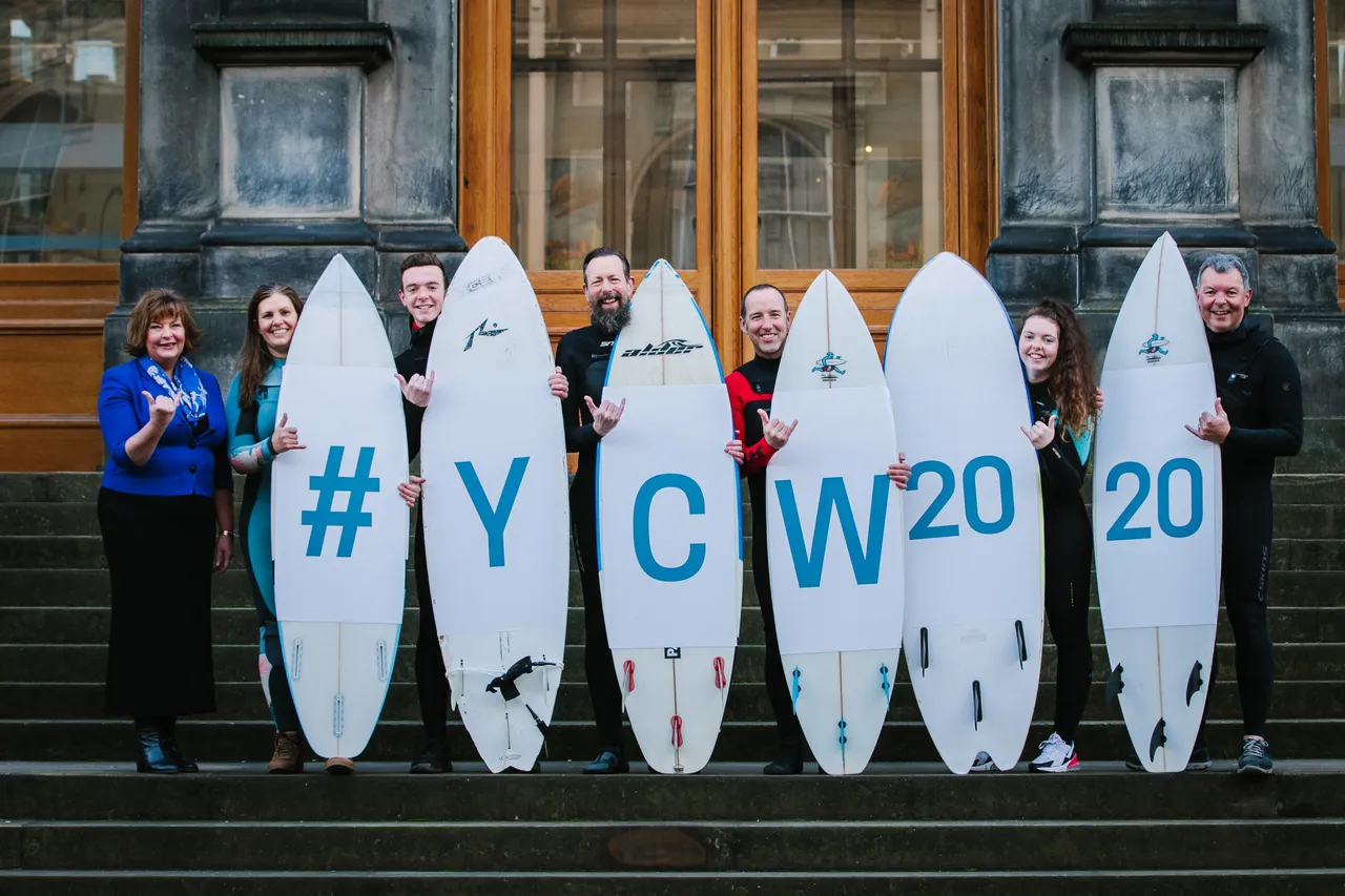 Surfers celebrate 50 days to go until the Year of Coasts and Waters 2020