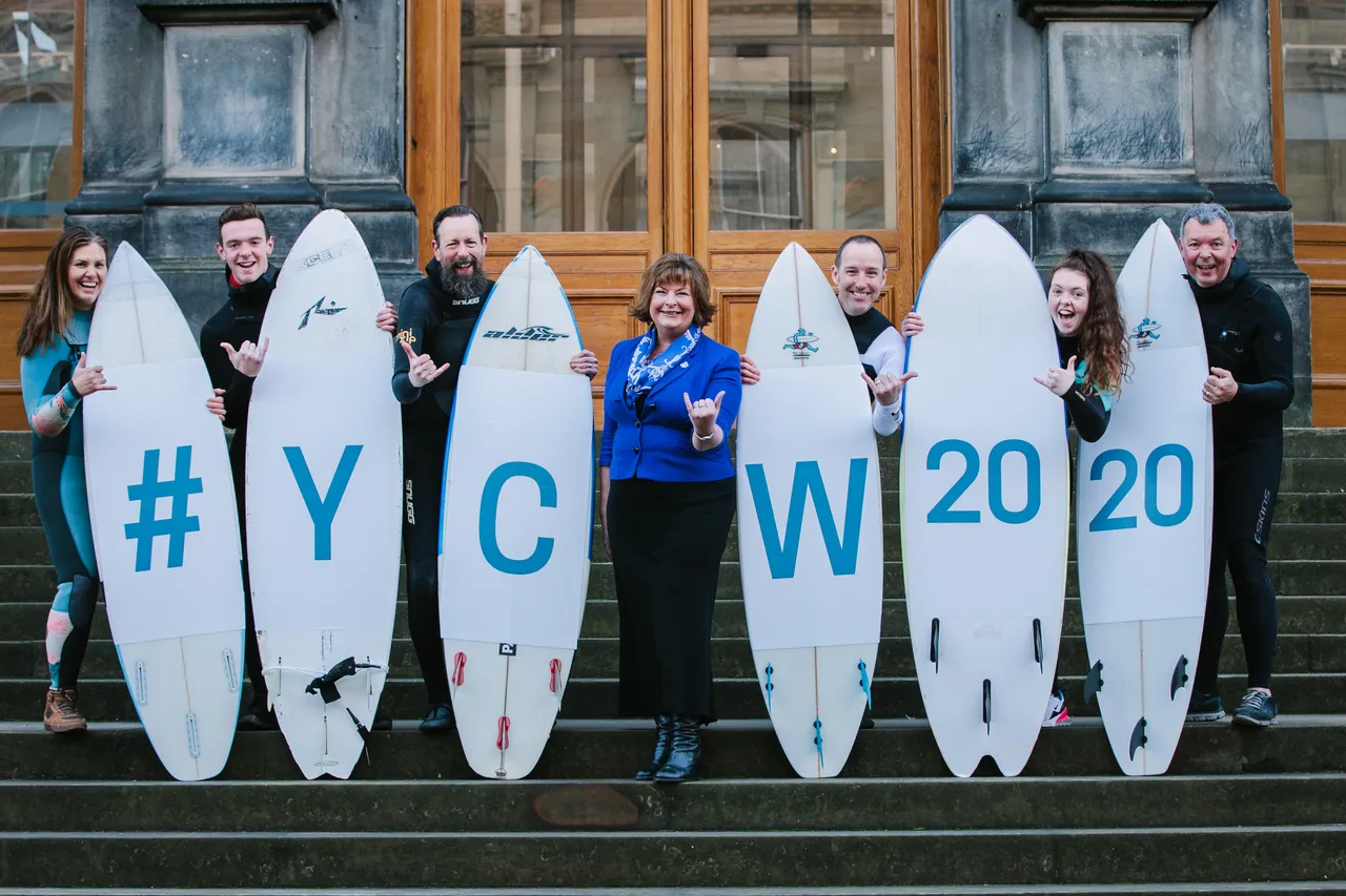 Surfers celebrate 50 days to go until the Year of Coasts and Waters 2020