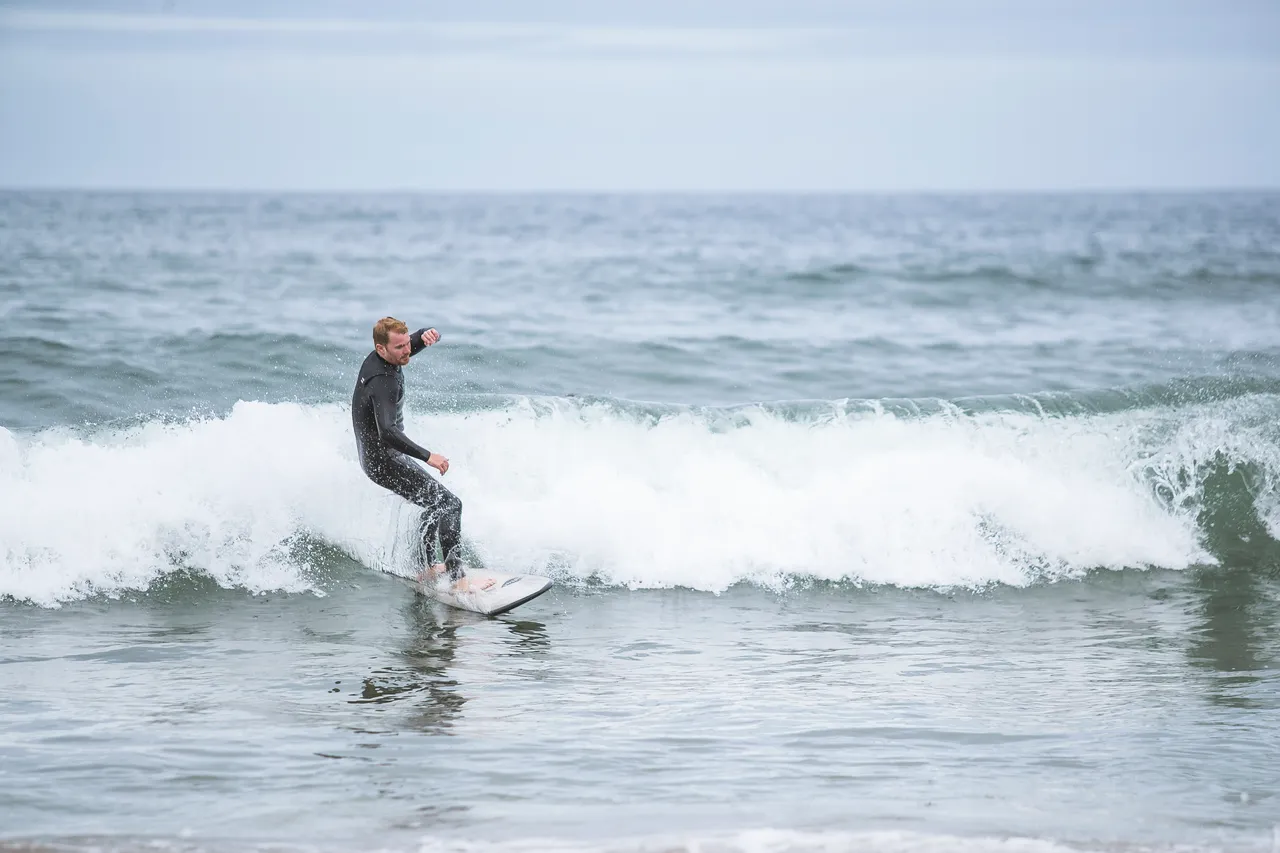 Surfer at Coldingham Bay