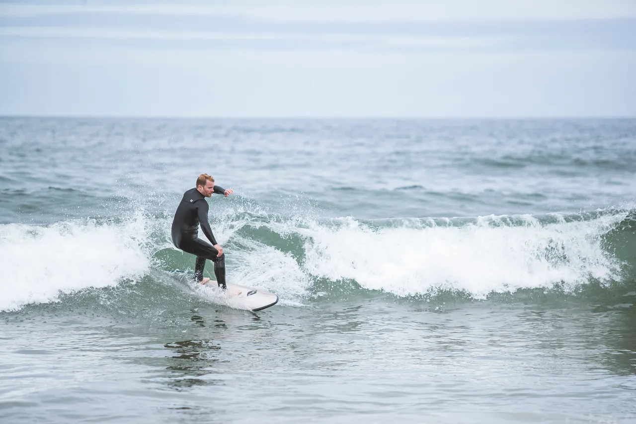 Surfer at Coldingham Bay