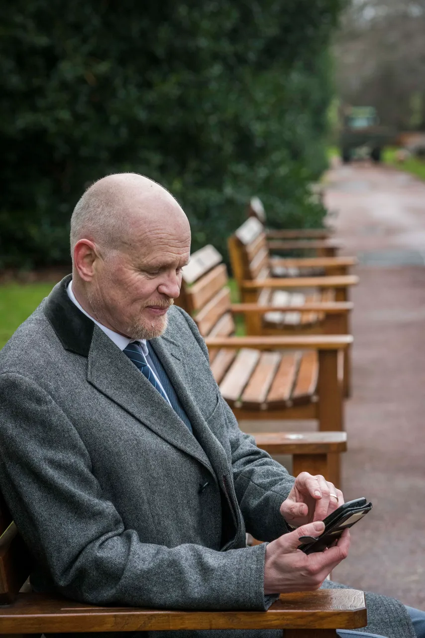 A man uses a smartphone