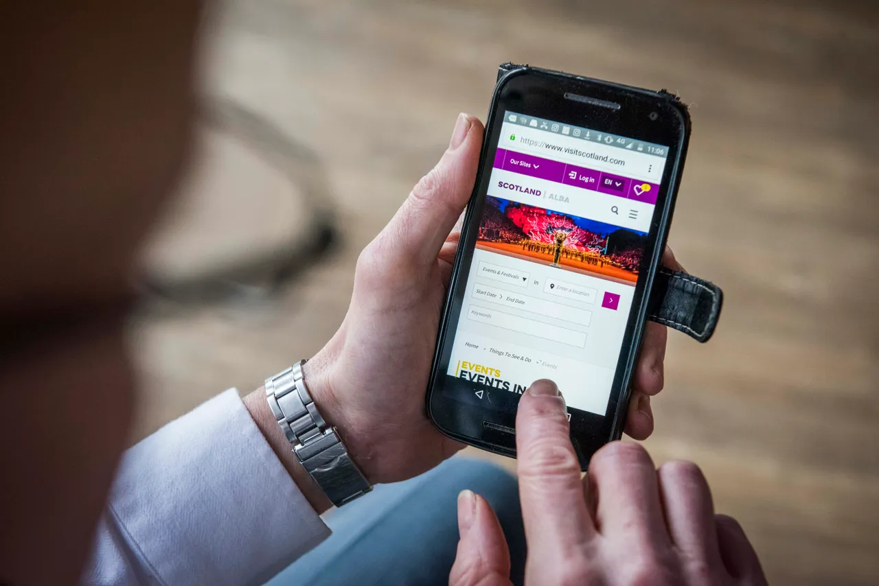A man uses a smartphone