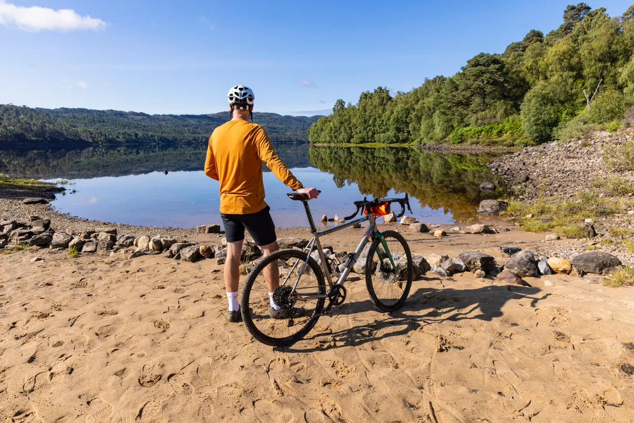 Cyclist at Loch Beinn a Mheadhoin, Glen Affric