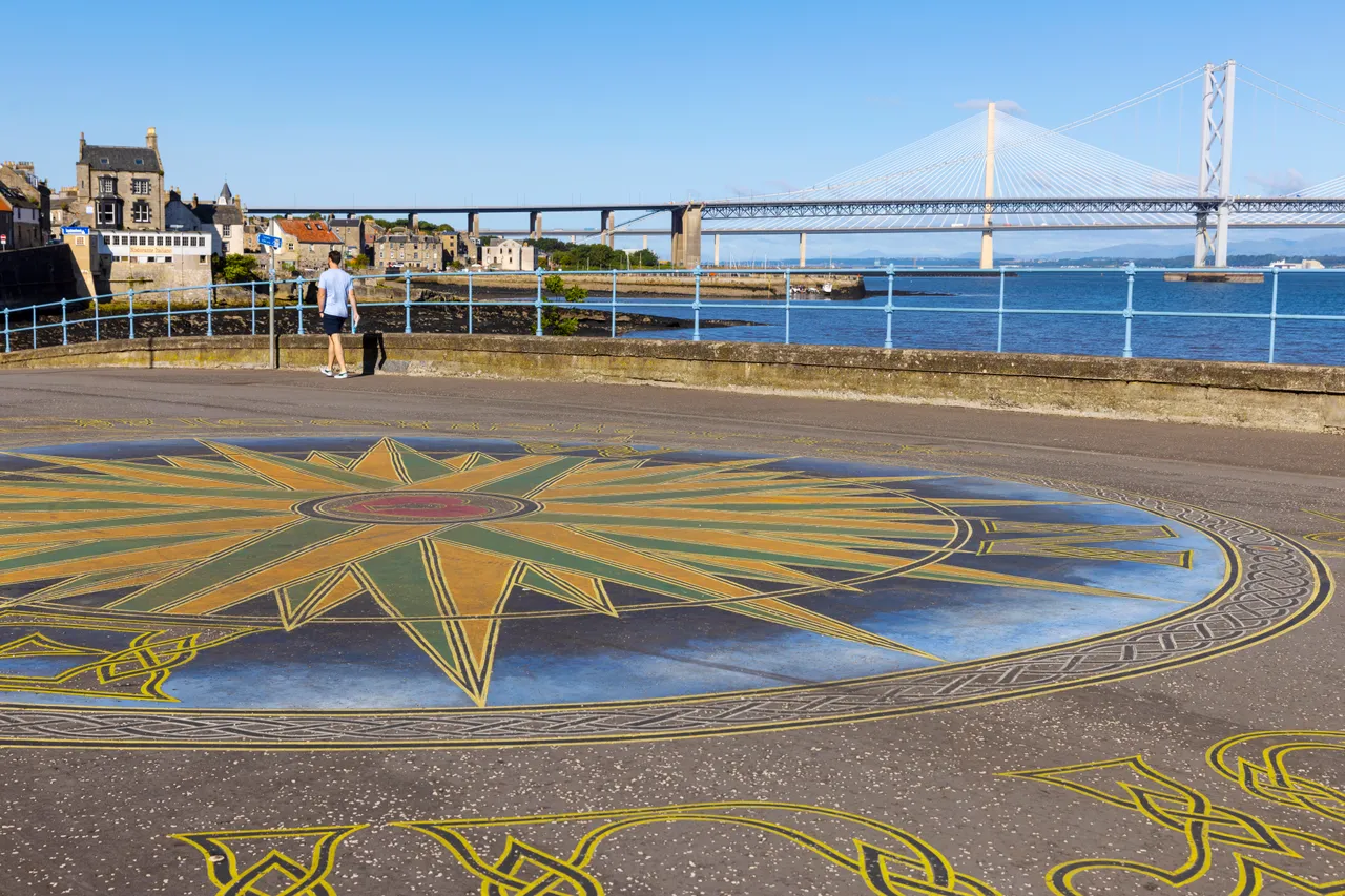 Victor Fraser’s 'Compass of the North’ artwork in South Queensferry with the Queensferry Crossing and Forth Road Bridge seen beyond Crossing and Forth Road Bridge seen beyond