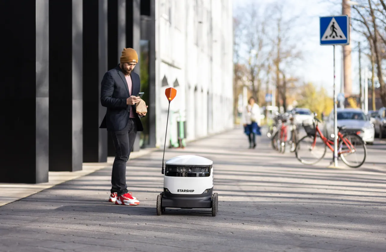 Man ordering Starship delivery robot
