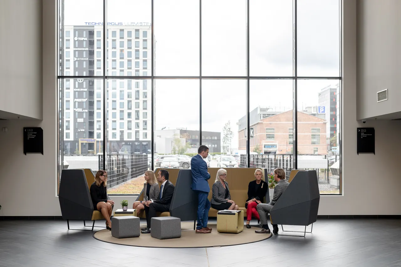 Business meeting in lobby