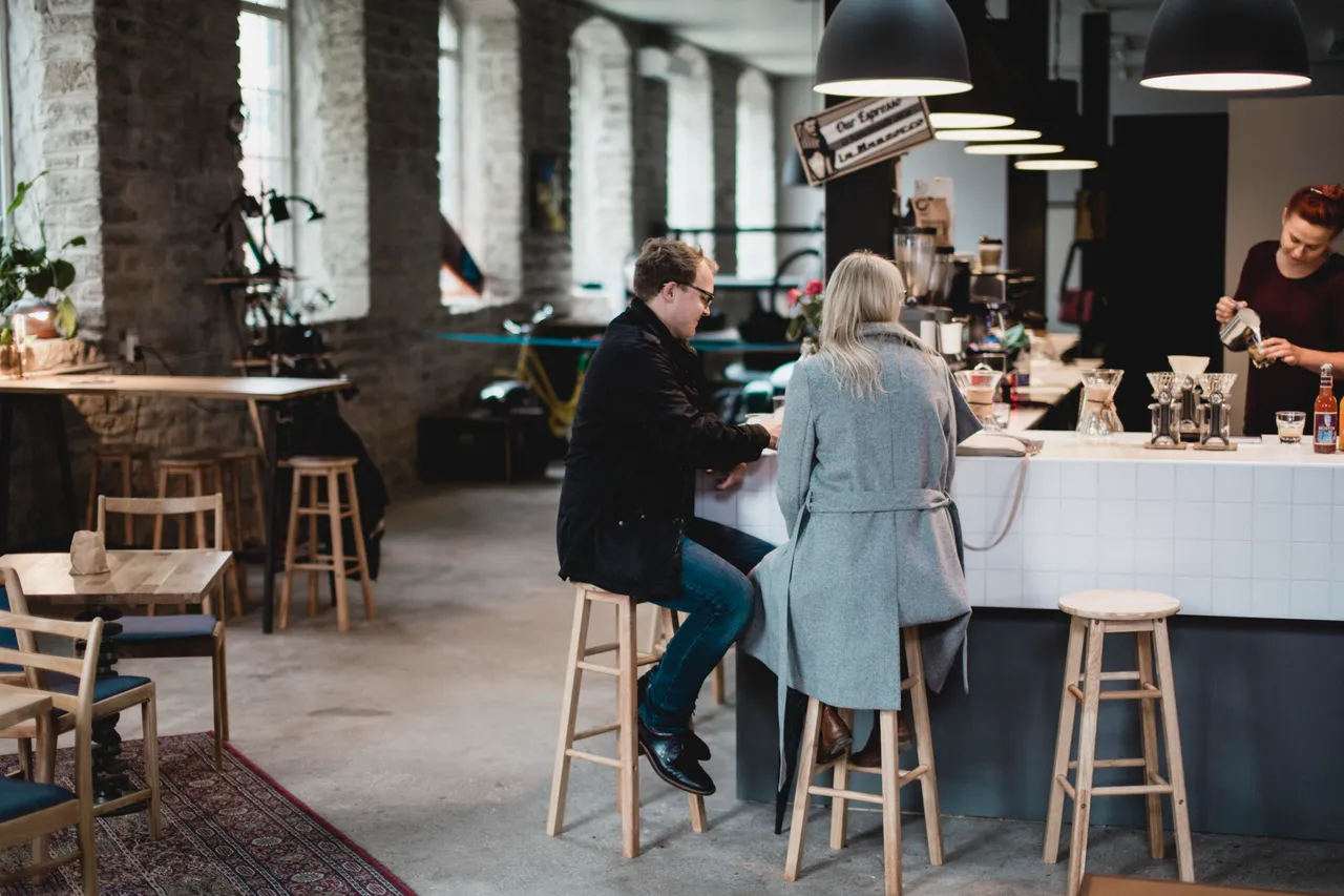 People in cafe Renard Speed shop