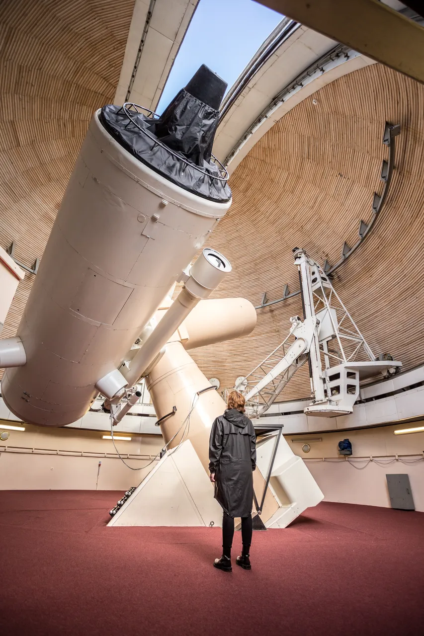 Telescope and a visitor at Tartu Observatory
