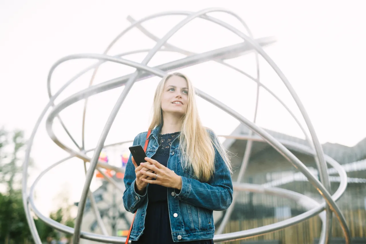 Woman standing in front of Balti Jaam Market