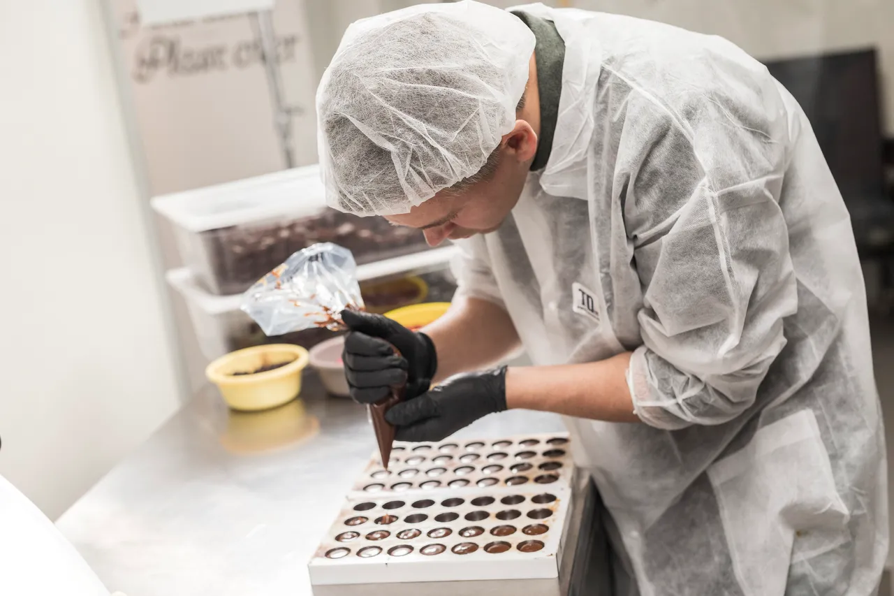 Man making handmade chocolate candy