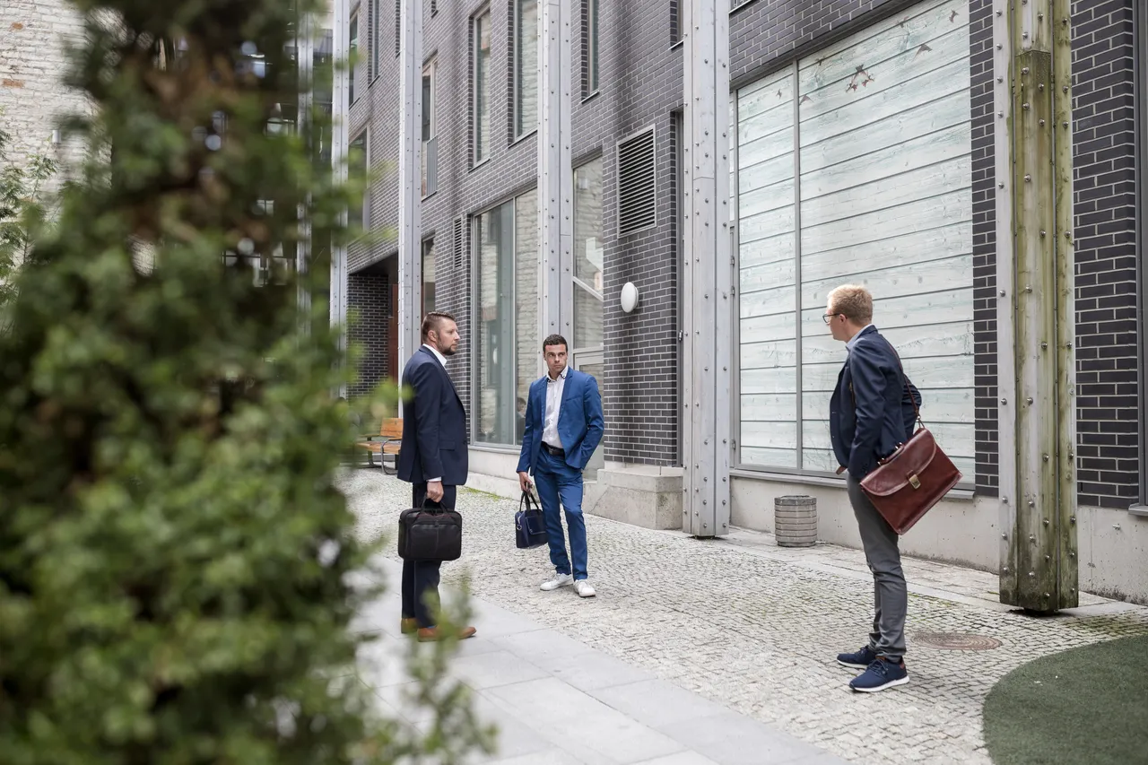 Three men in Rotermann city