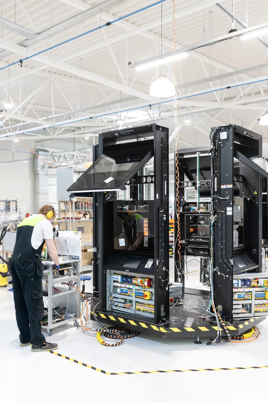 Man assembling pack robot