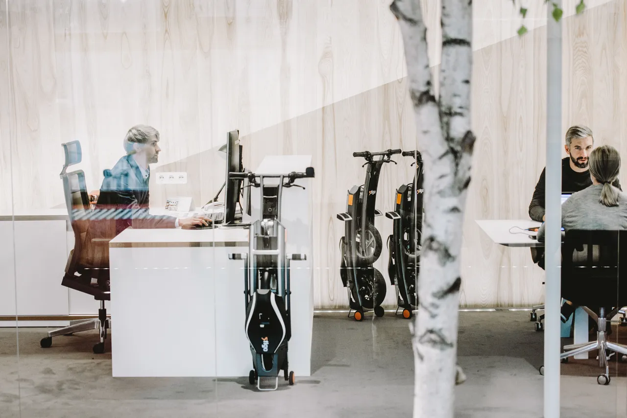 People working in office with bikes