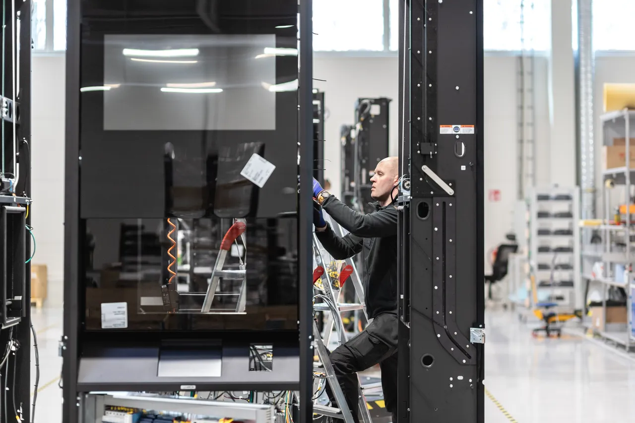 Man assembling pack robot