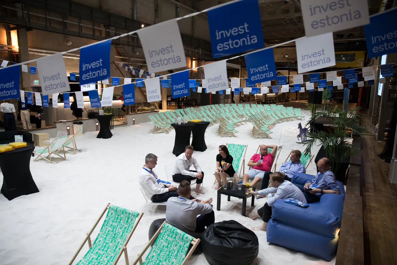People meeting in a indoor beach hall