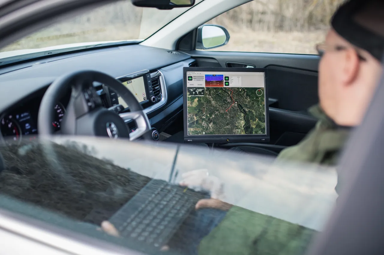 Man navigating with computer in a car