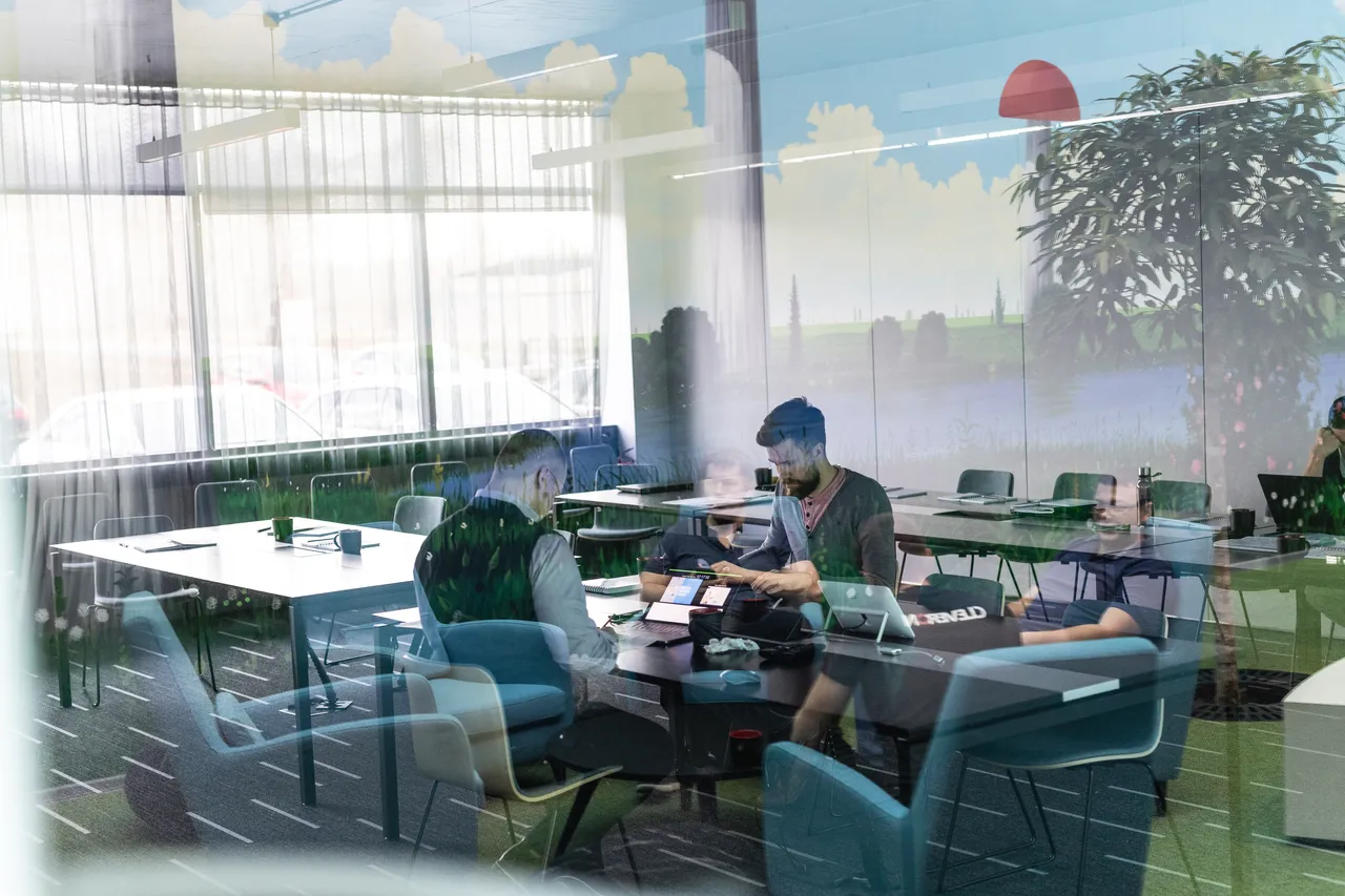 Group of men at a meeting