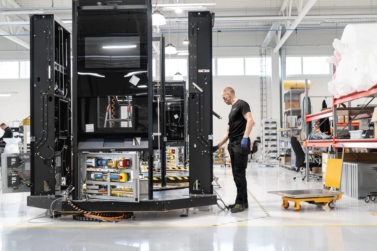 Man assembling pack robot