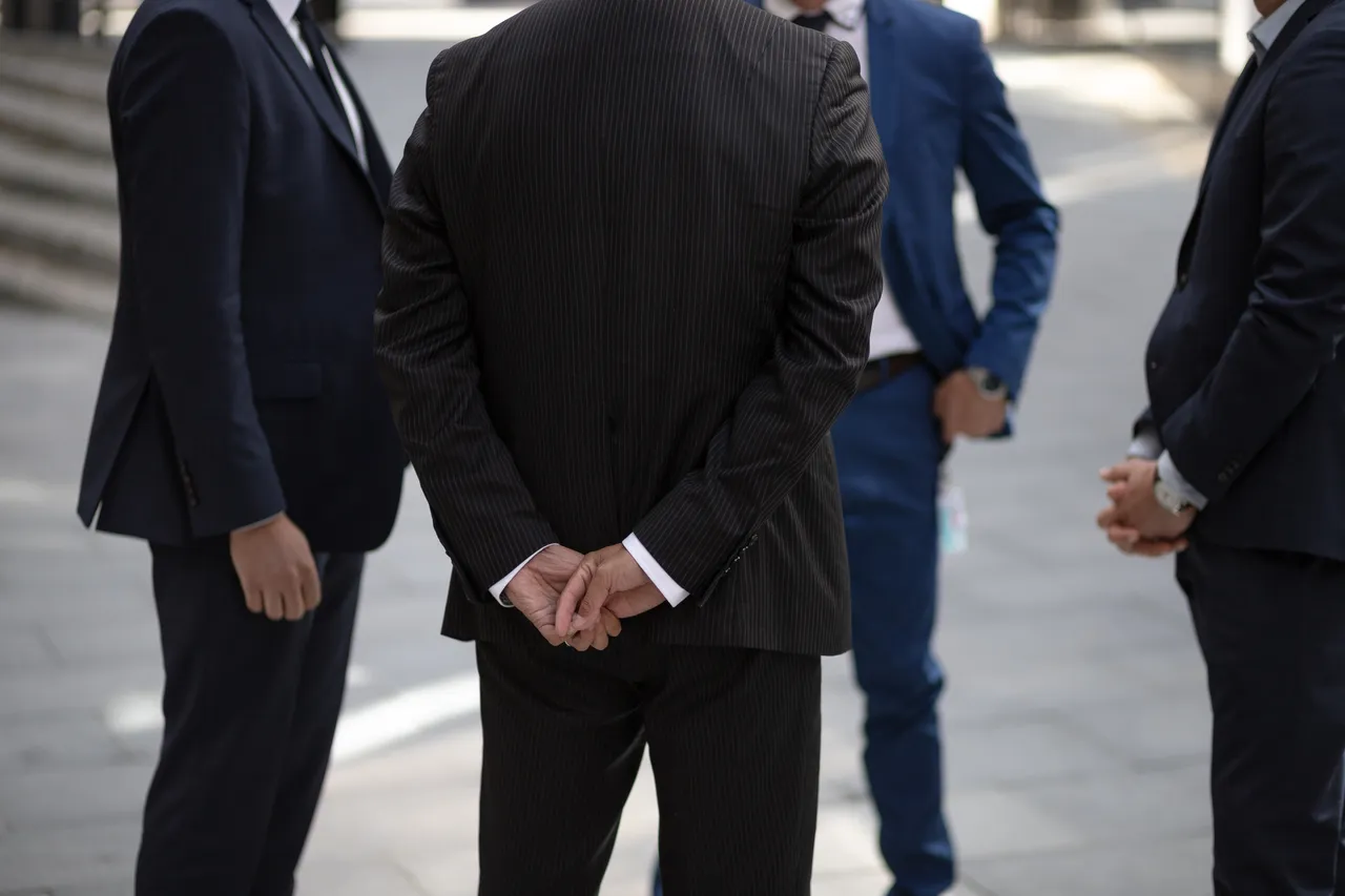 Business man standing in circle