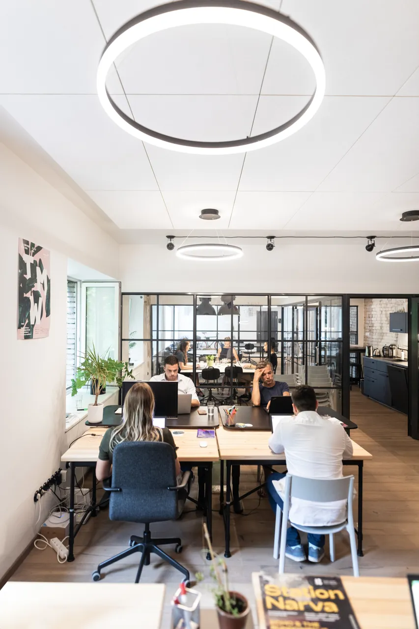 Group of people working in open office