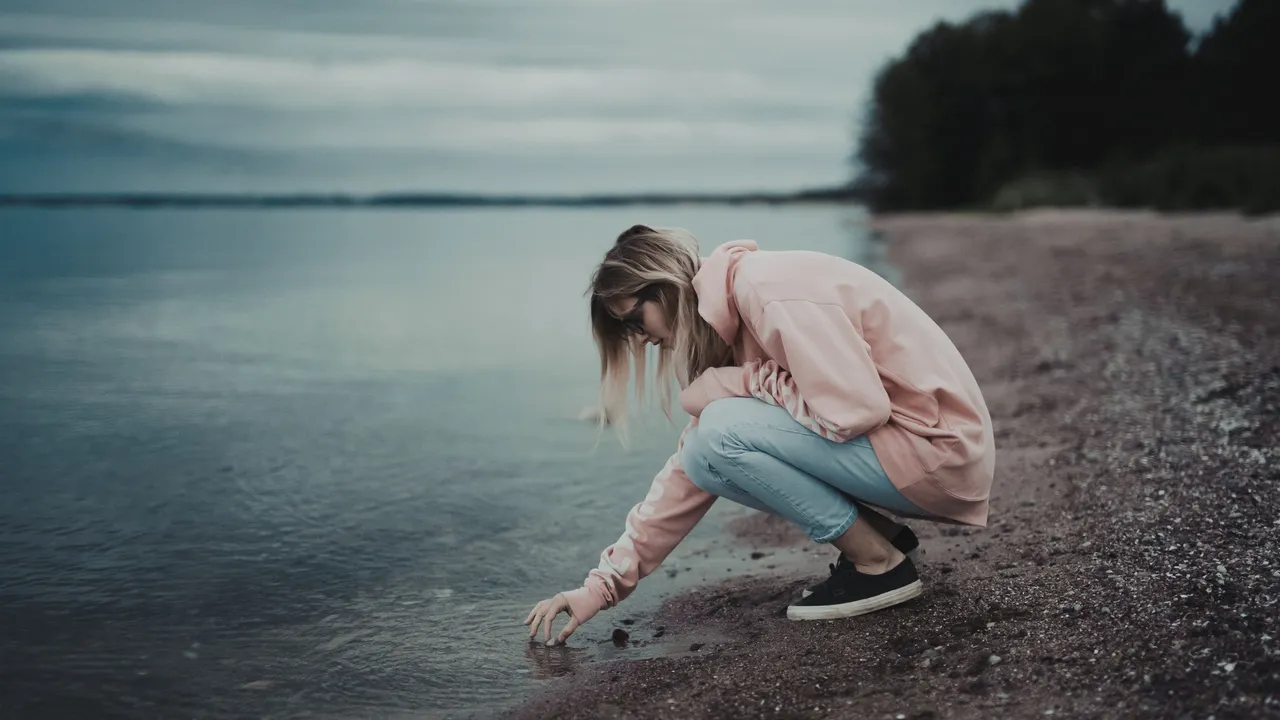 Girl by the Sea Water