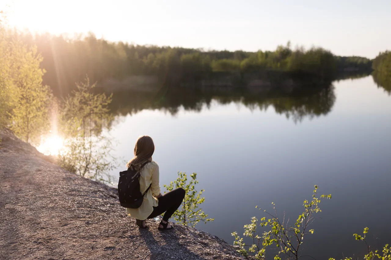 Girl by lake