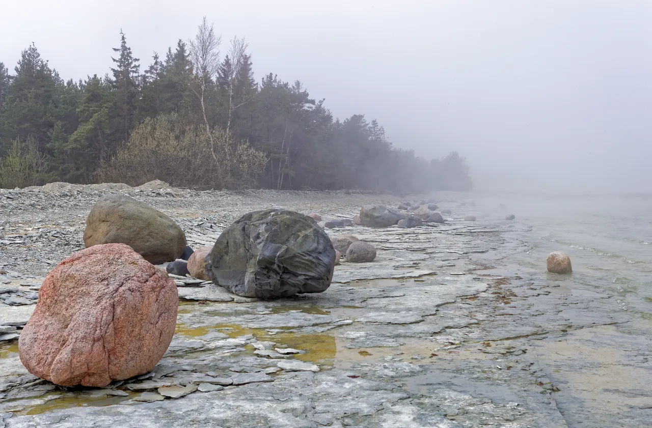 Boulders in mist