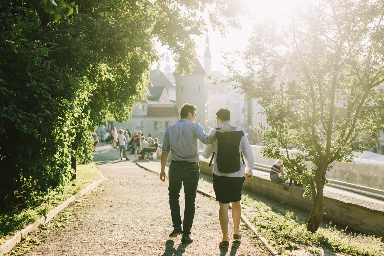 A couple of friends walking in Tallinn Old Town