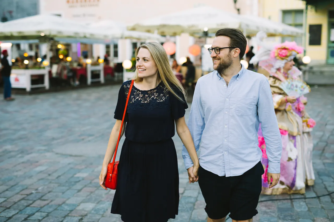 Couple walking in Tallinn Old town