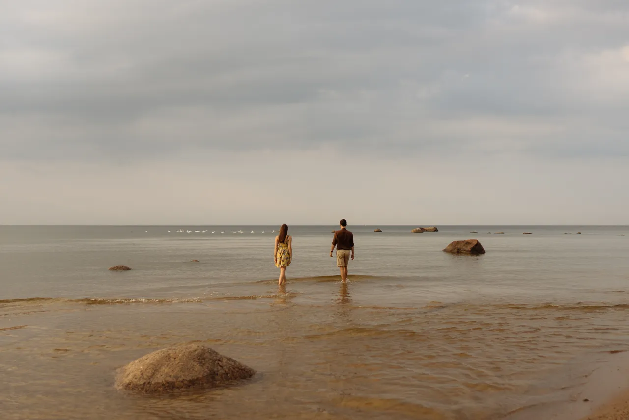 Couple walking on beach