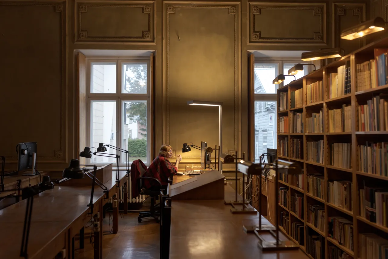 Woman working in the library reading hall
