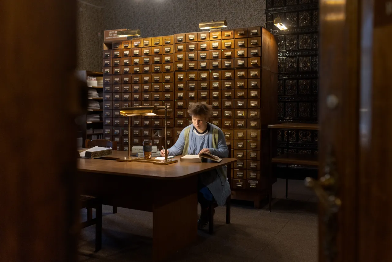 Female researcher working in a library