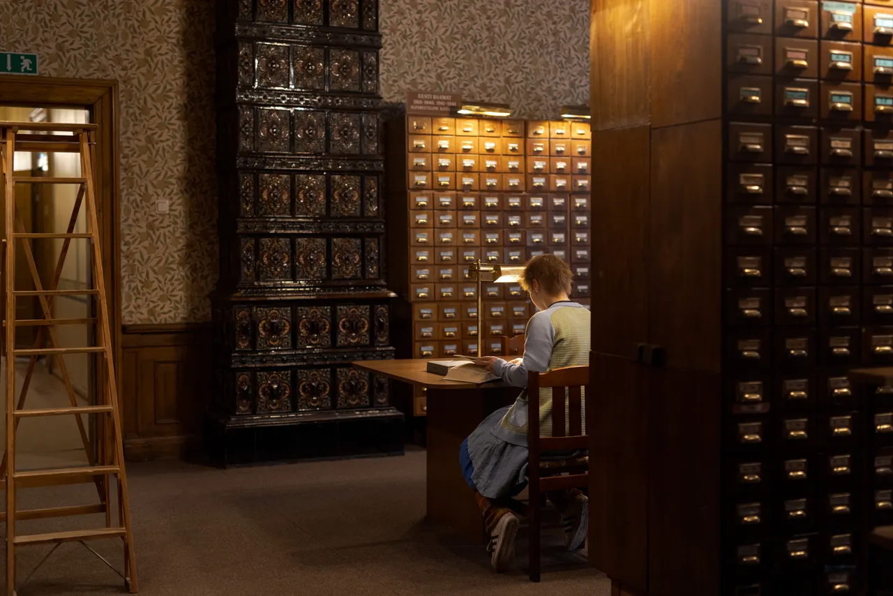 Female researcher working in a library