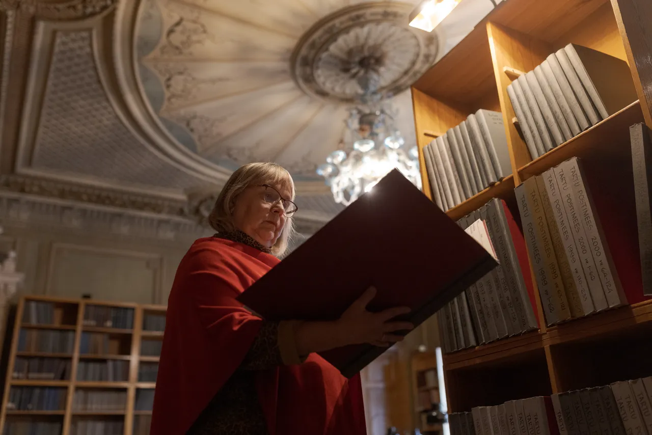 Female researcher in archival library