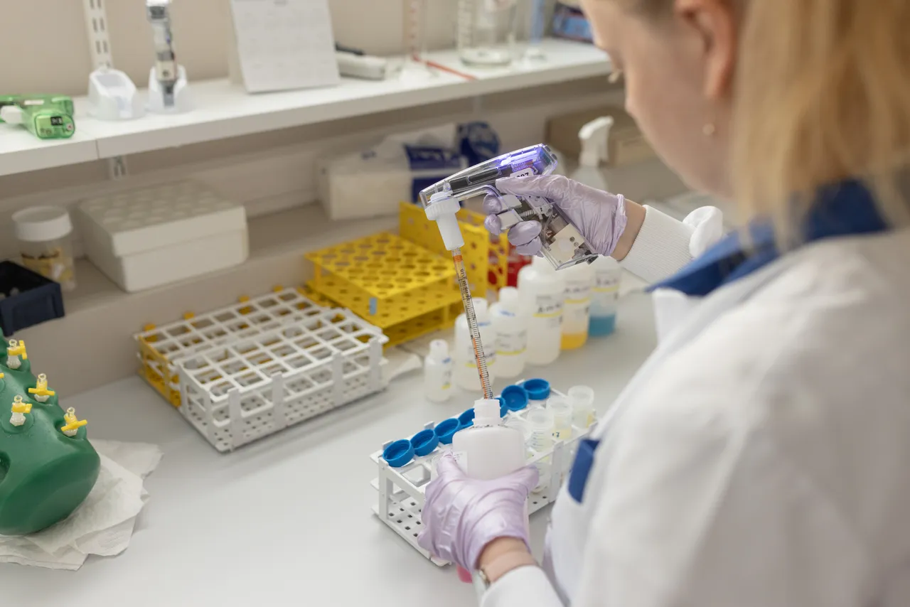 Laboratory technician conducting test