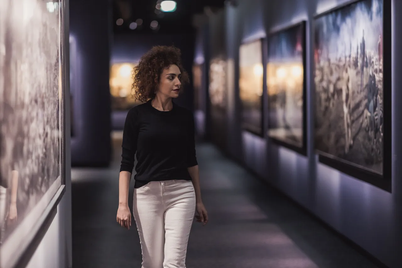 Woman walking in gallery