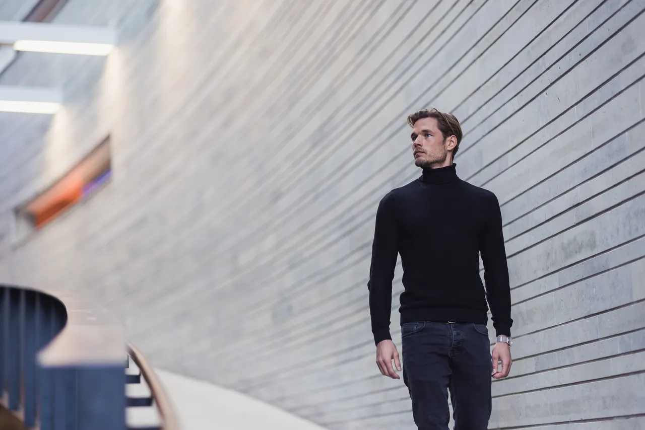 Man walking in large modern hall
