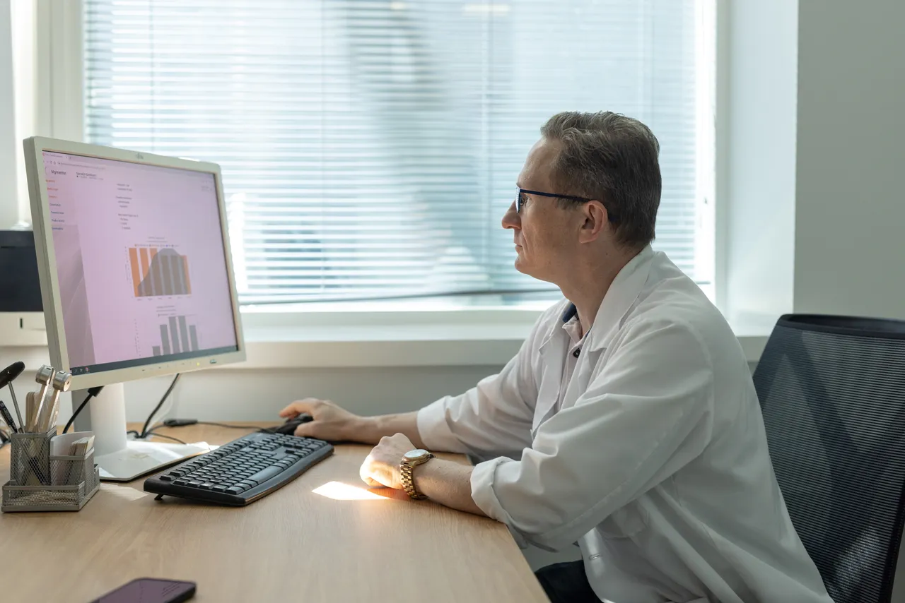 Doctor analyzing patient data