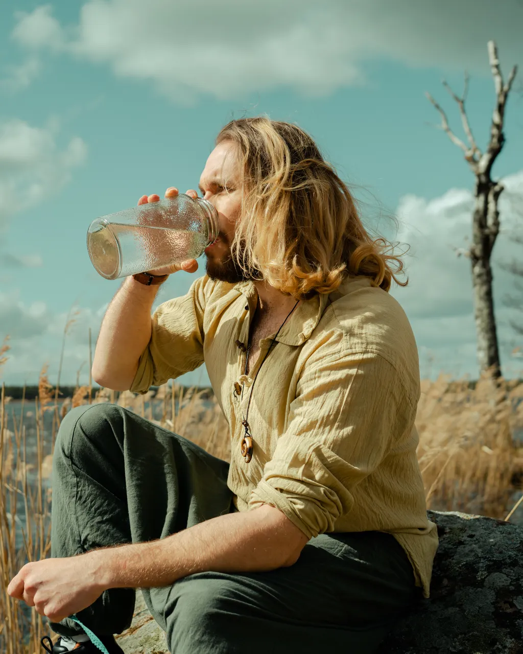 Man drinking birch sap