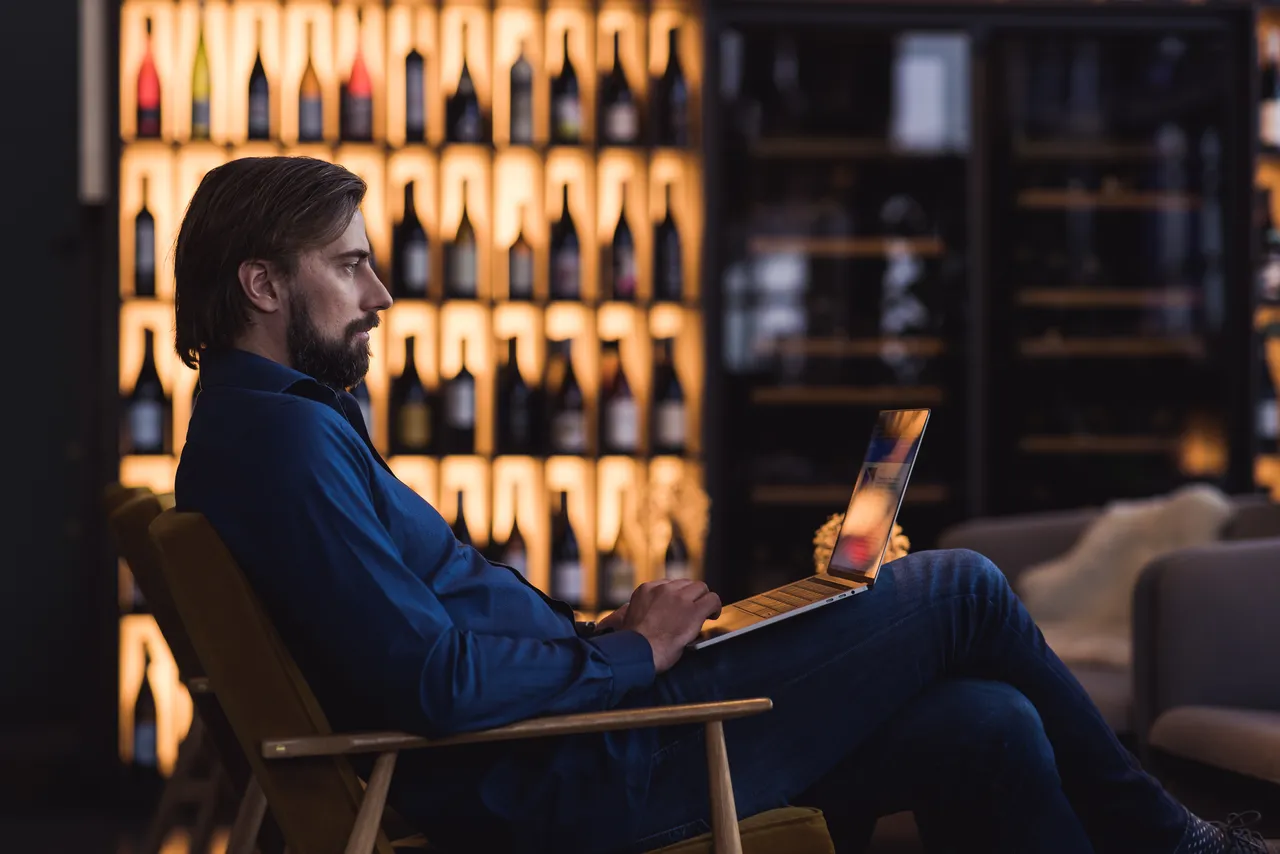 Man working in lounge