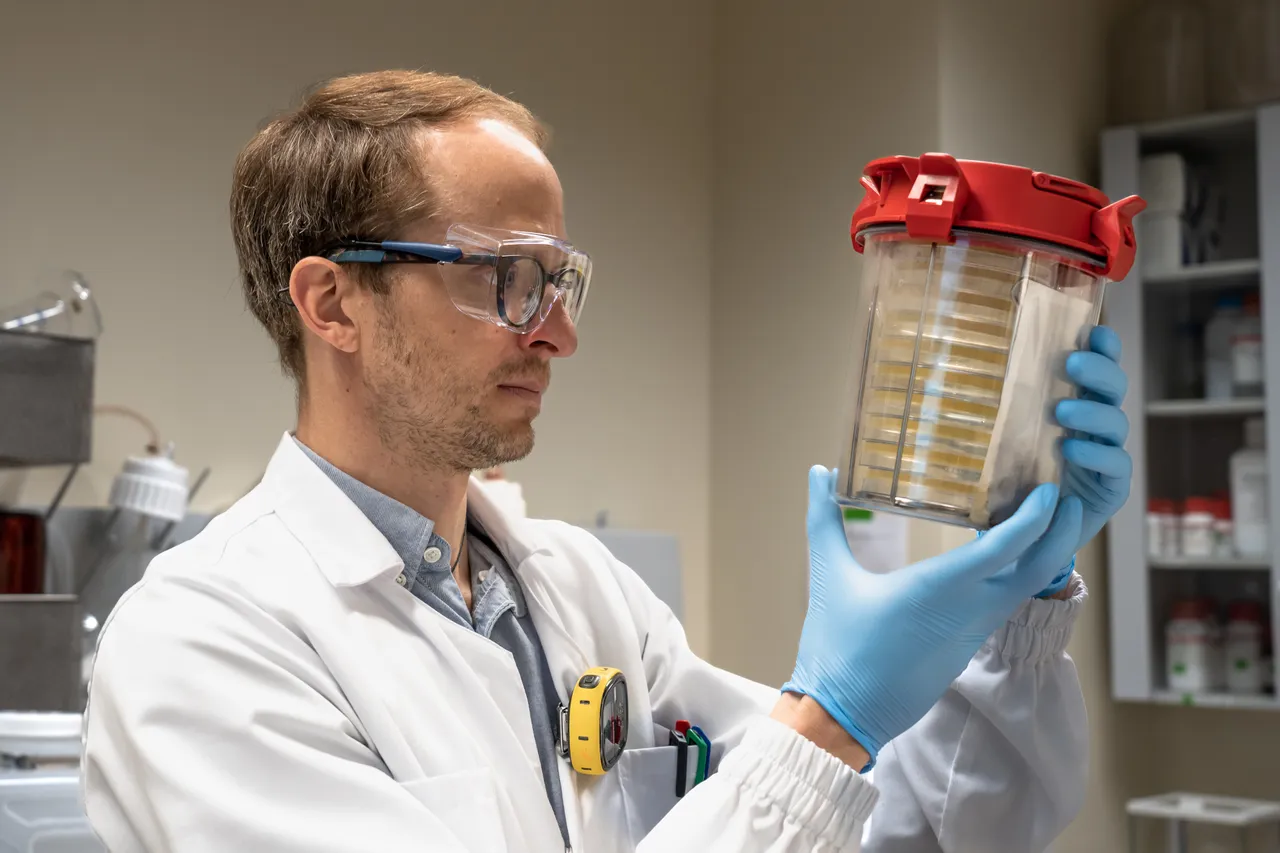 Professor researching biochemicals.