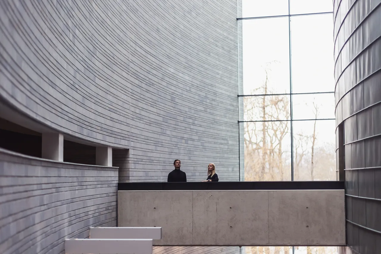Couple in large modern hall
