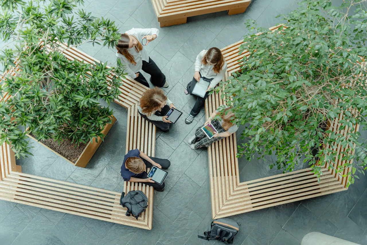 Students studying with tablets