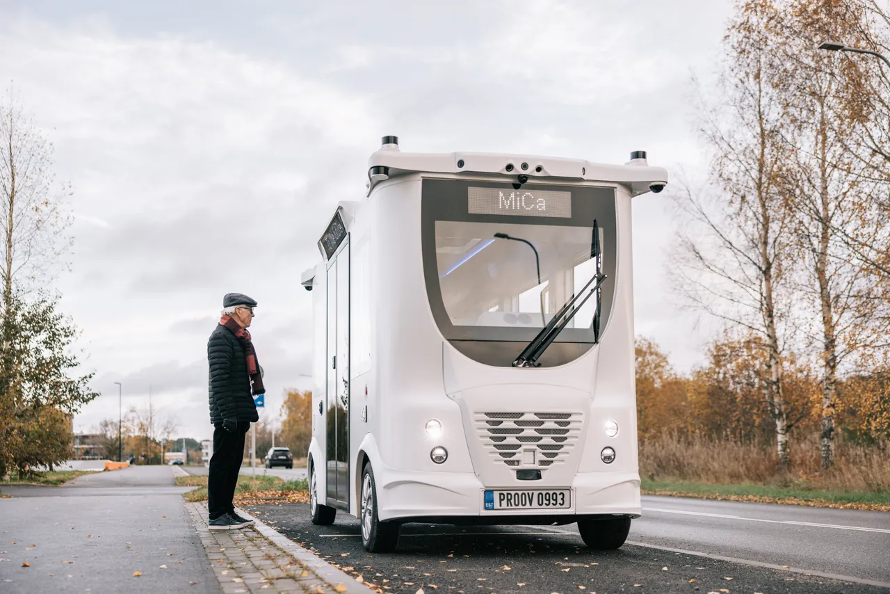 Man waiting for a self-driving bus