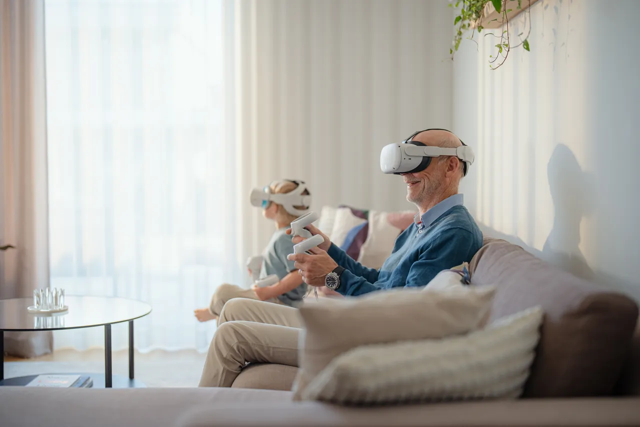 A child and grandfather with VR