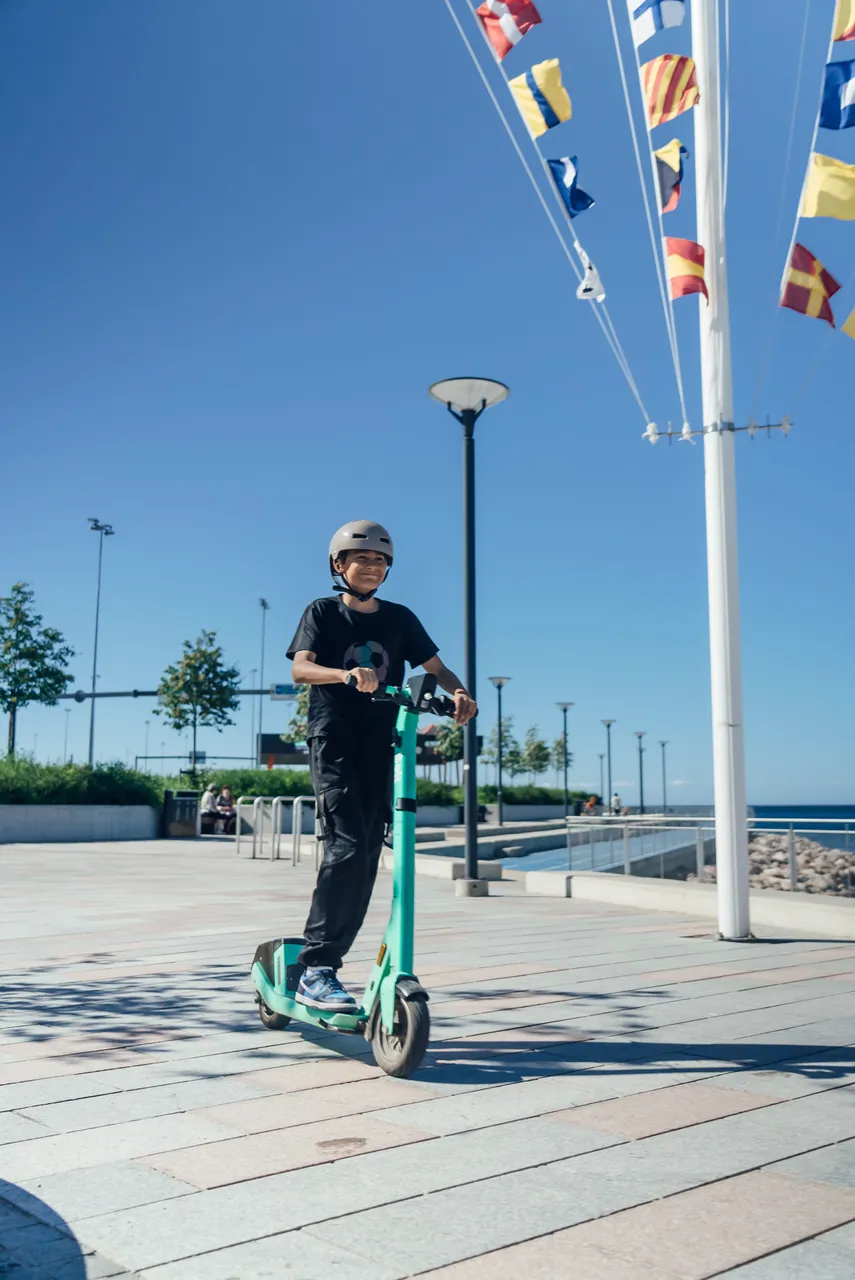 Young rider on scooter