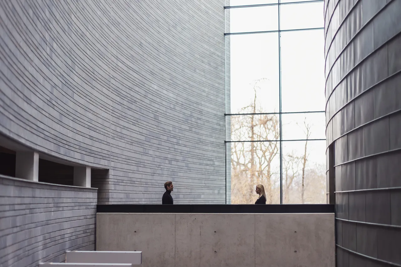 Couple in large modern hall