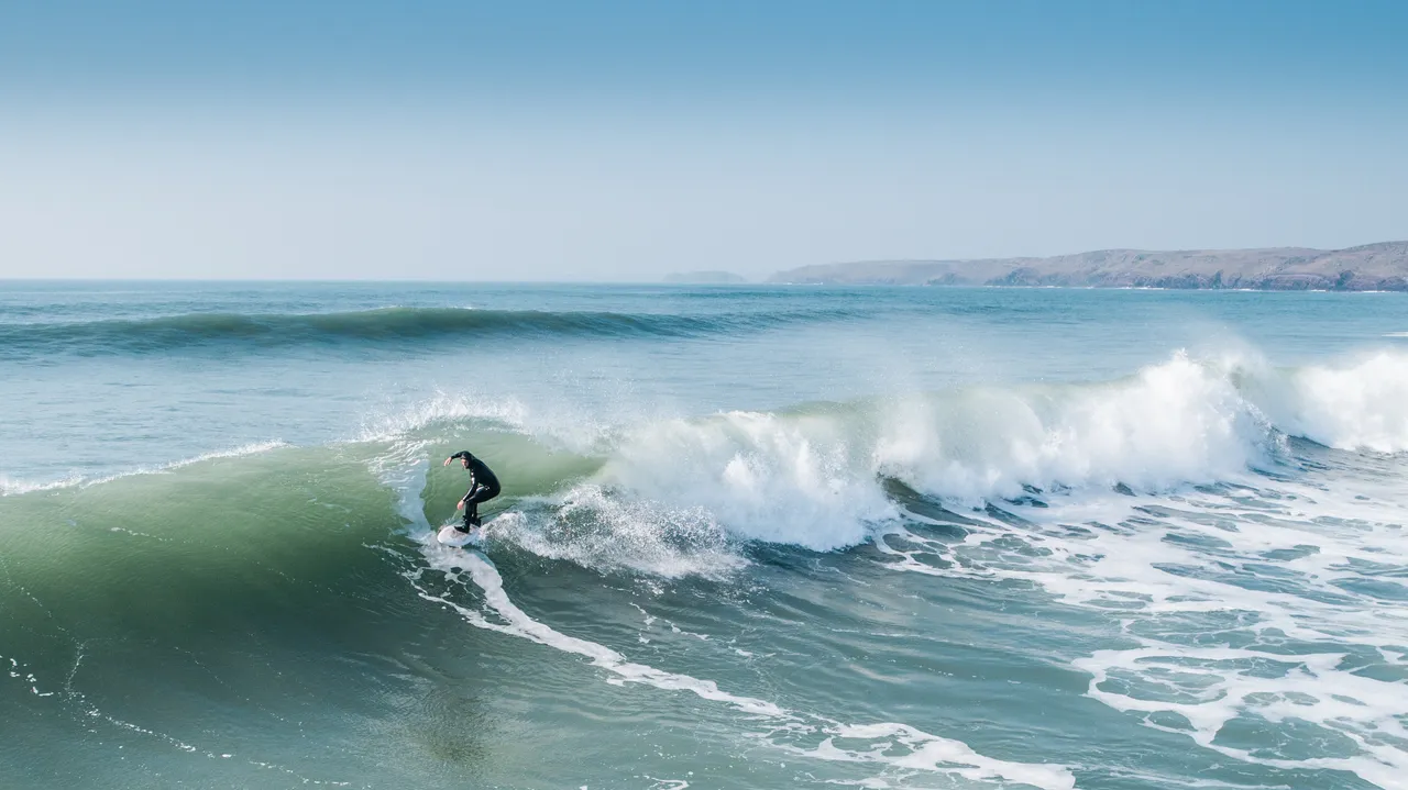 Surfing Down Broad Haven Beach