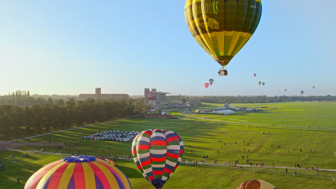 Balloons take flight at the Yorkshire Balloon fiesta at York Racecourse ©Project Yorkshire